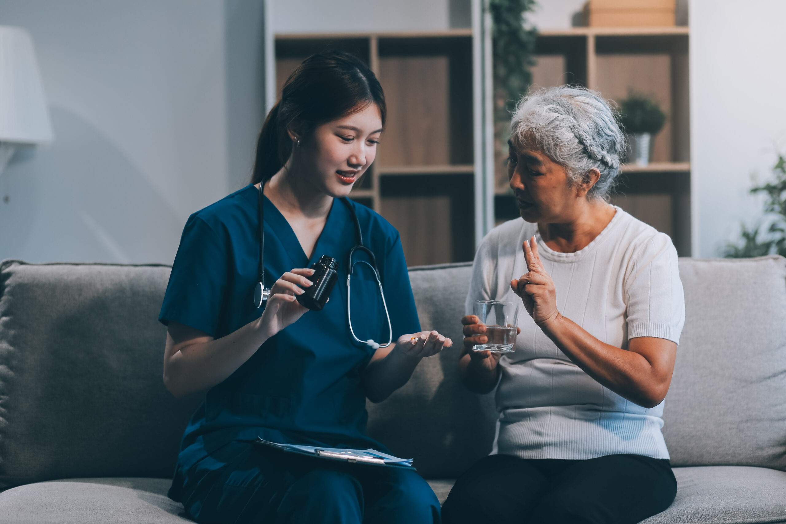 Doctor consulting with patient discussing something and Presenting results on report, Medicine and health care concept.